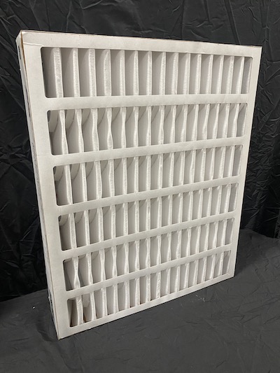 High-capacity white pleated commercial air filter designed to capture particulate and improve facility indoor air quality.